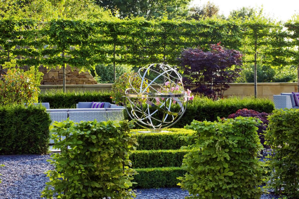 Using Garden Sculptures to Create Focal Points: One Piece That Makes Your Whole Garden Famous